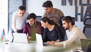 colleagues-working-project-discussing-details colleagues-working-project-discussing-details