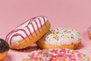 Donuts with cream and sprinkles