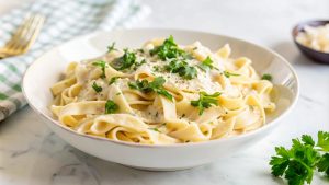 creamy pasta in tossed in garlic butter