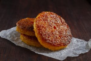 crispy potato cakes topped with delicious beef patties